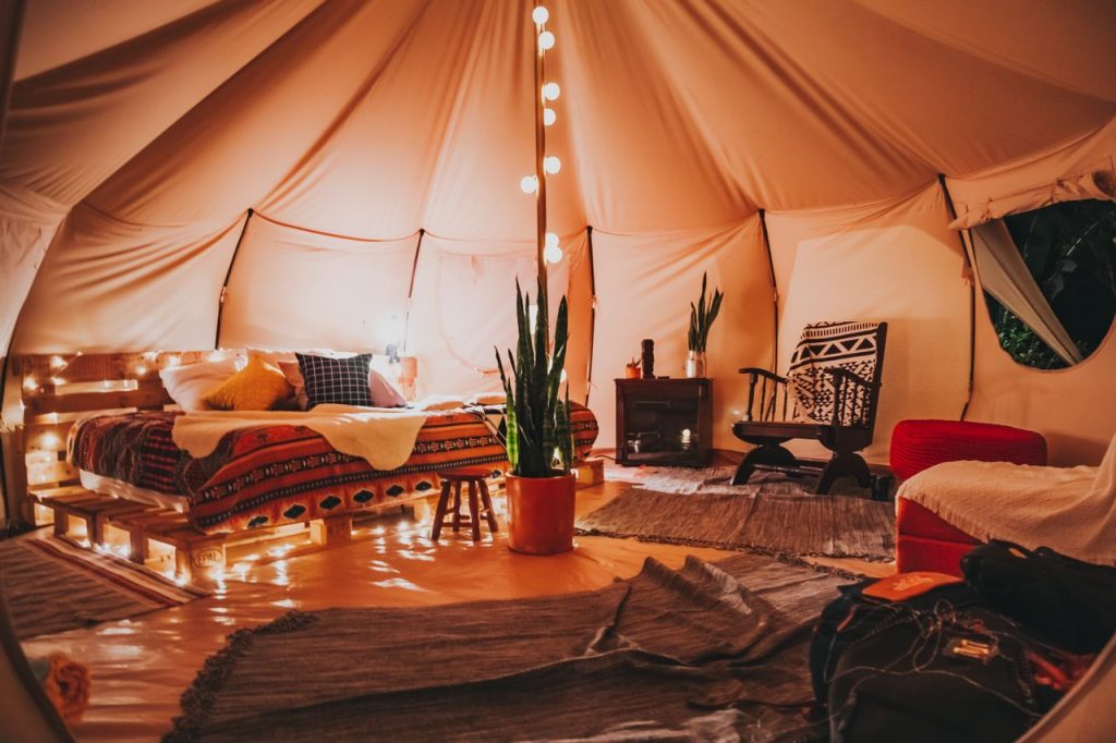 Berber desert camp tent with rugs and lanterns in the Moroccan Sahara
